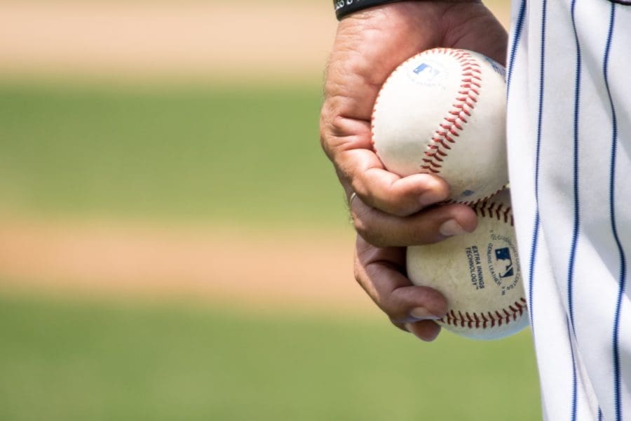 Baseballs in hand