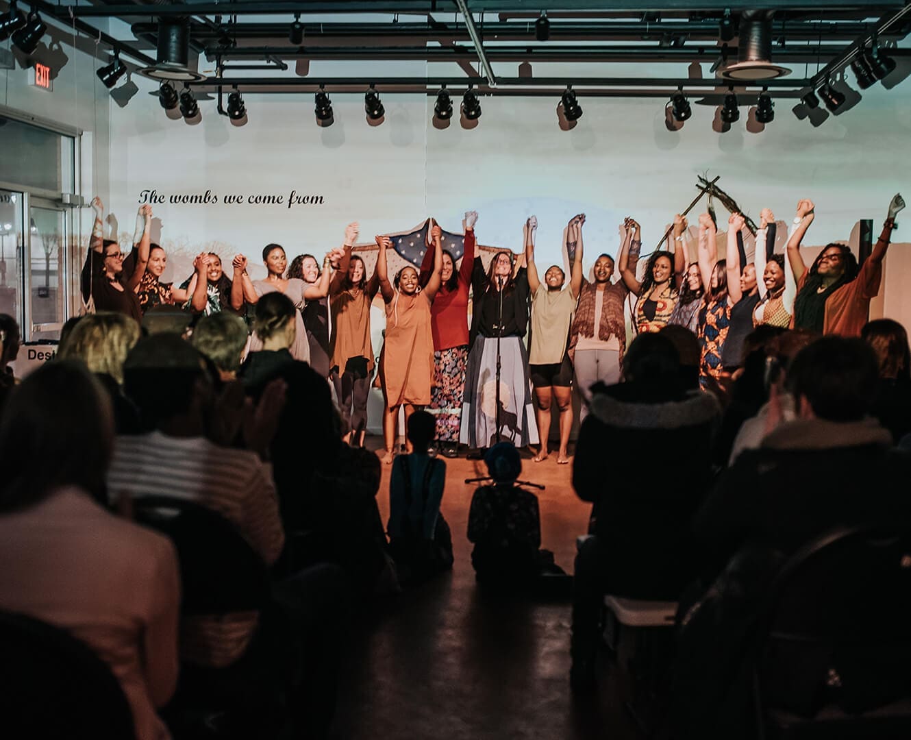 Skirts a fire Photo by April MacDonald Killins performers stand for a bow after a performance