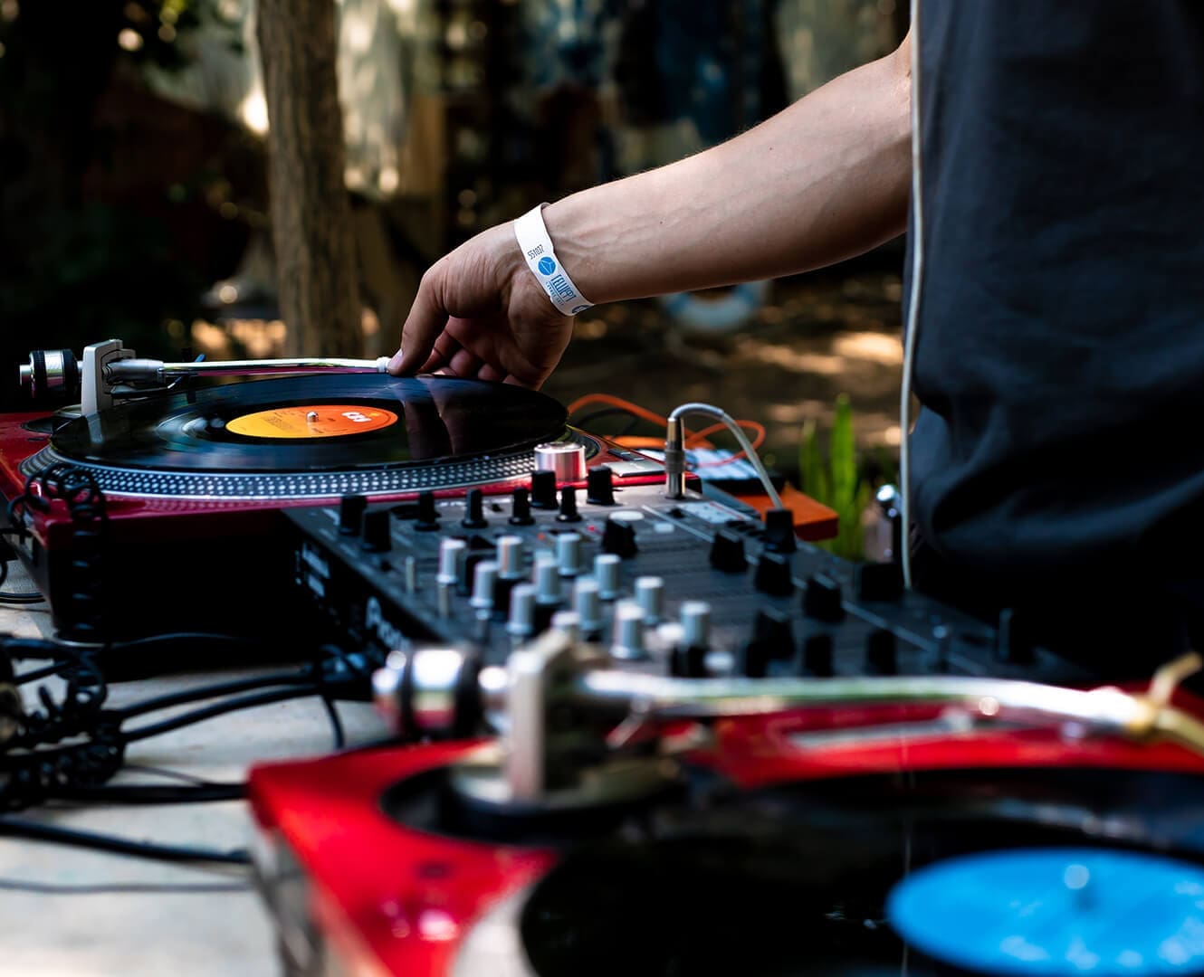 Canadian hip hop playlist DJ plays music on turntable