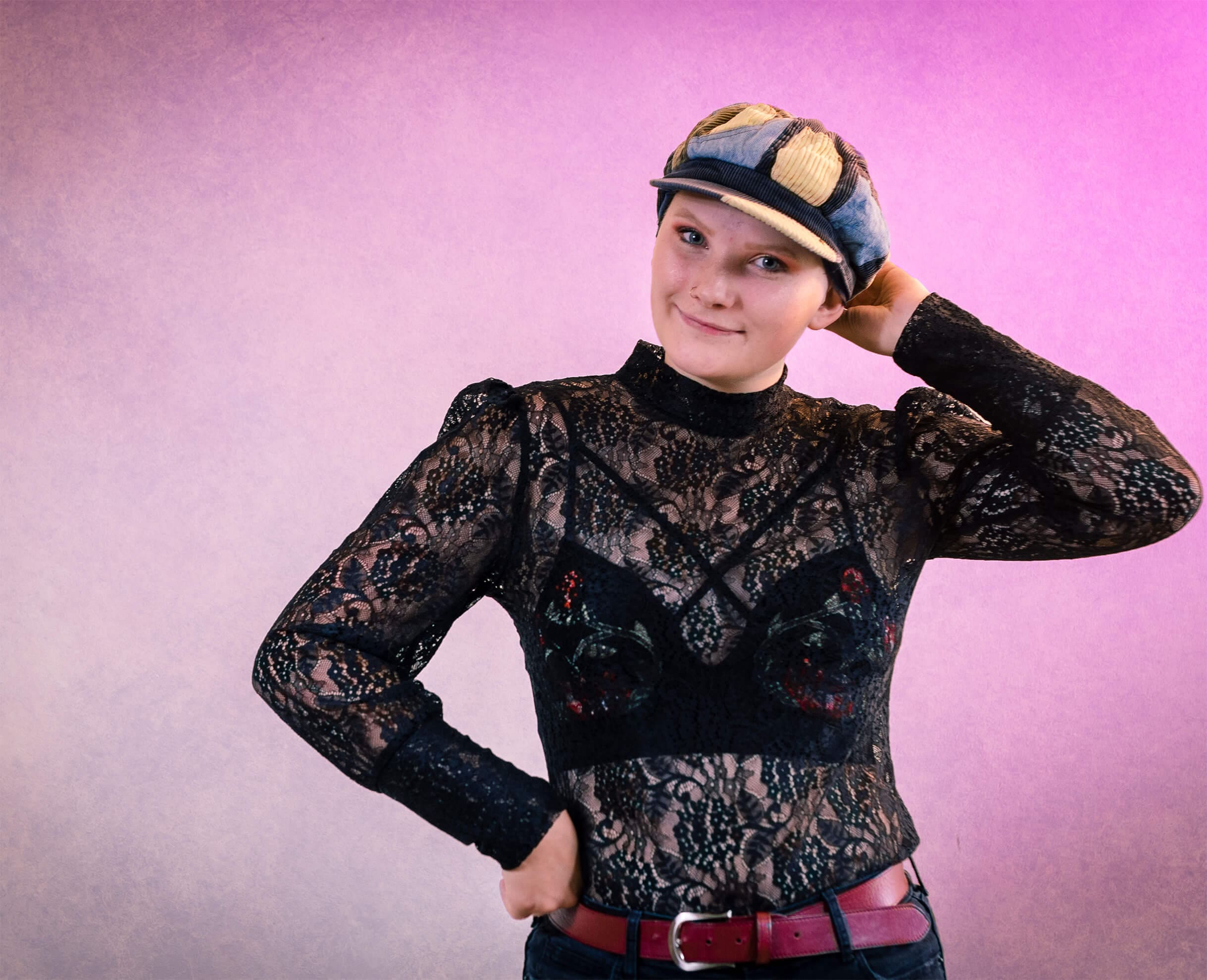 Woman wearing hat faces camera