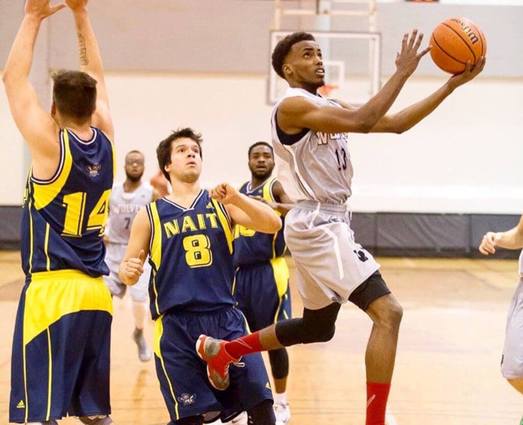 Grande Prairie Wolves Play bounced the basketball down the court