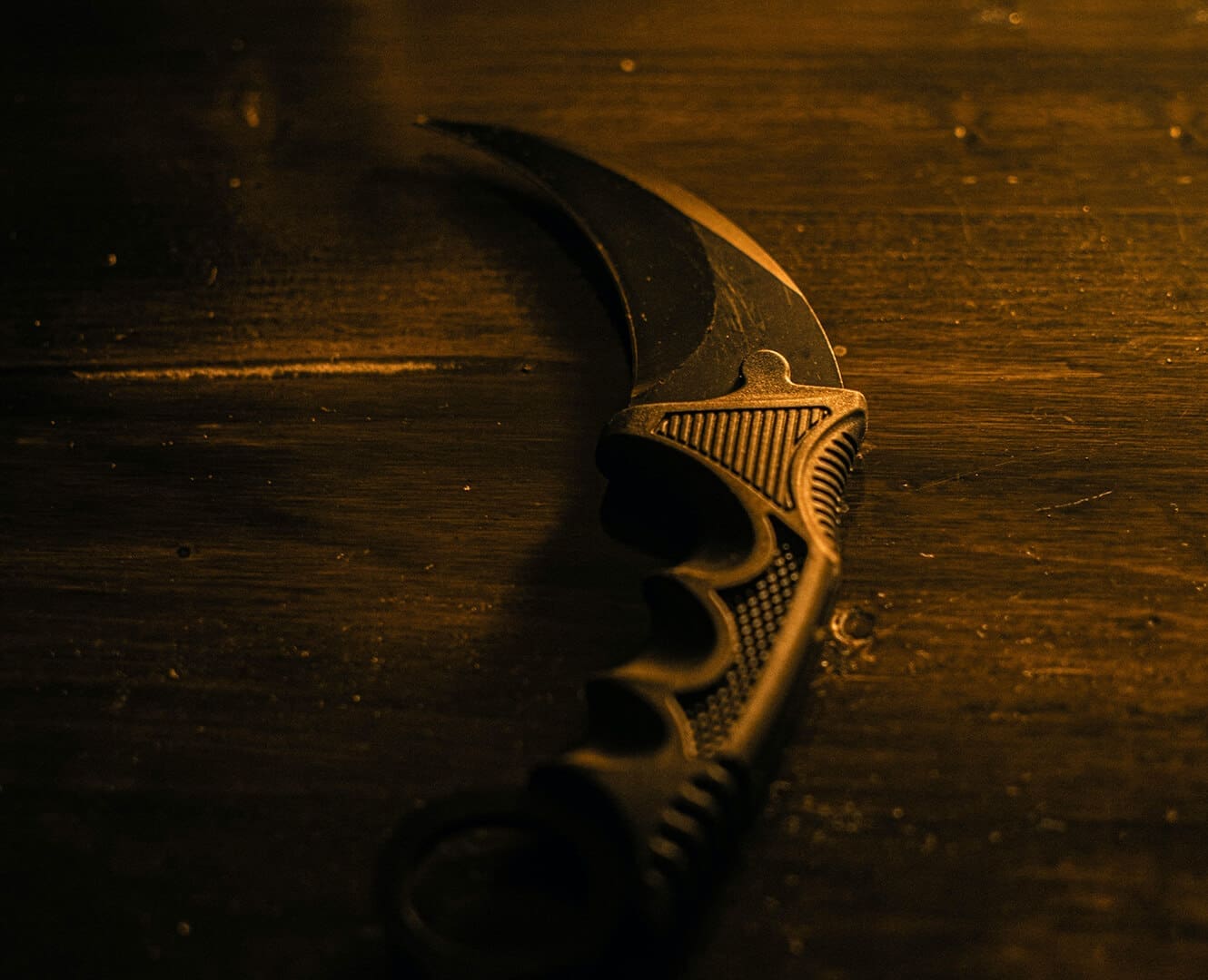 Drifter part 6-2 A knife sits on a wood table in a dark room