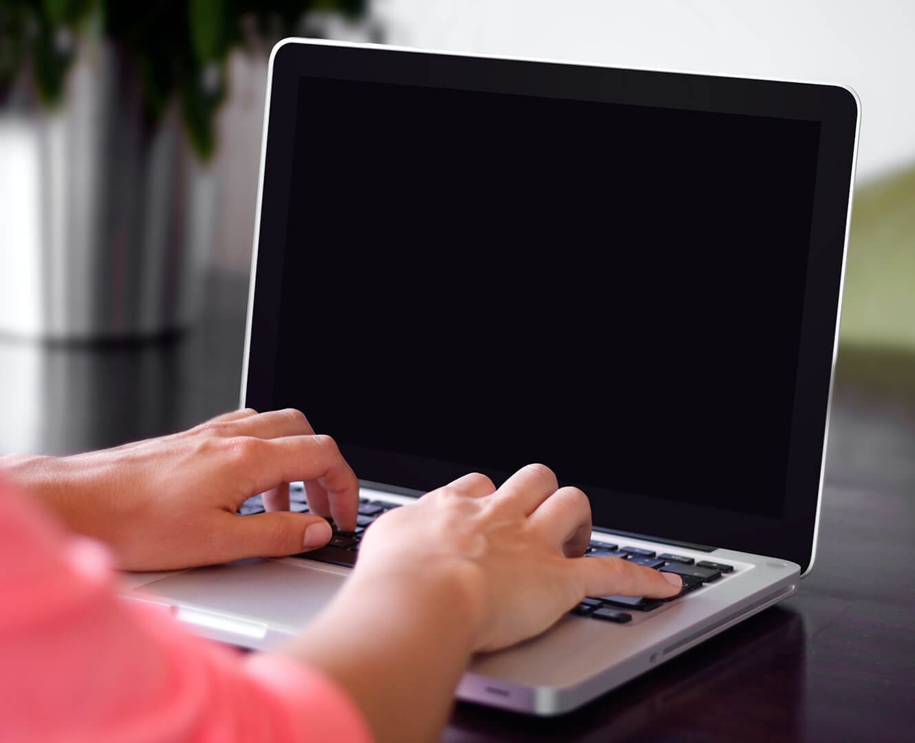 person working on laptop computer