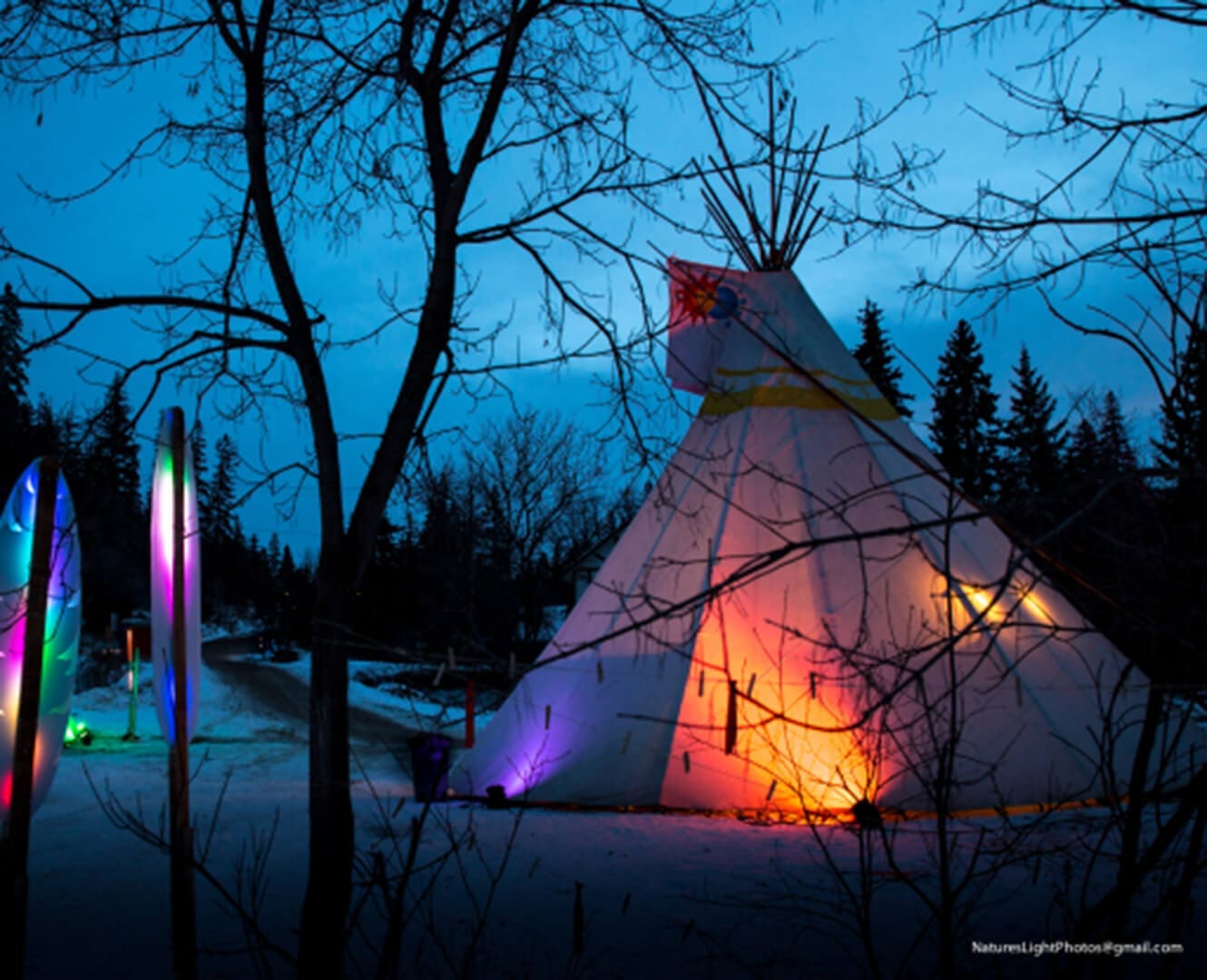 Illuminated teepee at flying canoe volant festival