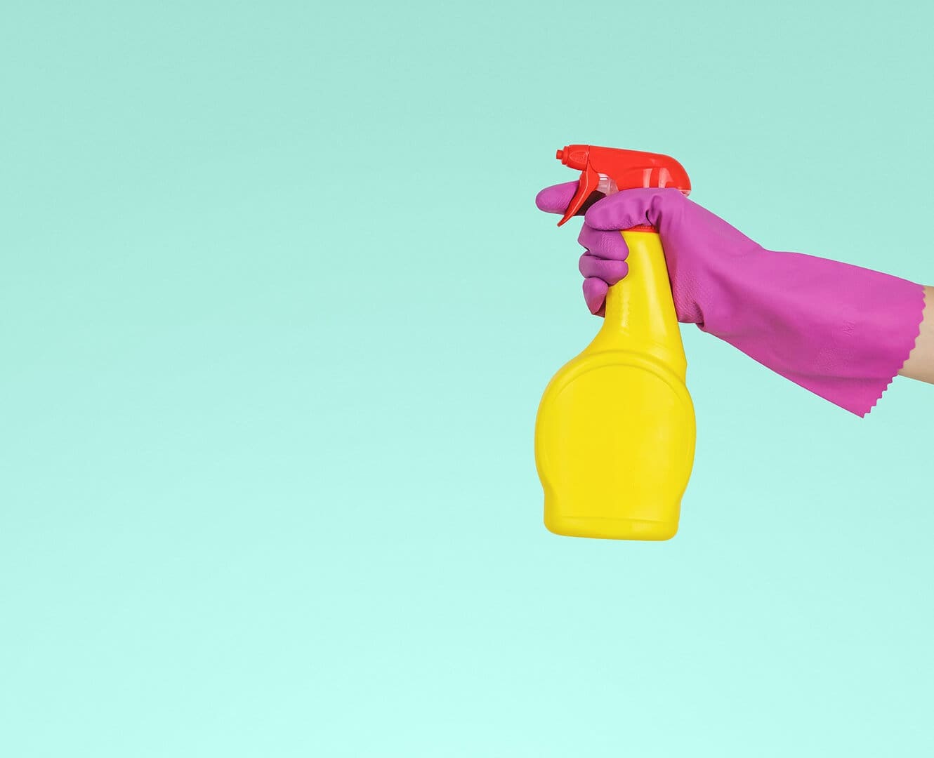 How to earn money from your hobbies Person holding bottle of cleaning disinfectant