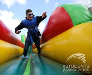 Man running on bouncy castle