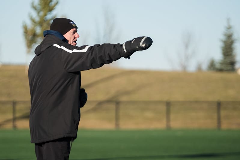 soccer coach pointing