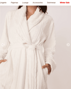 woman wearing a fluffy white robe