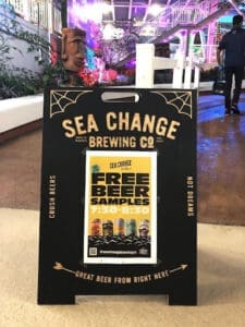 A display at the Splash and Bash event, advertising free beer samples to swimmers