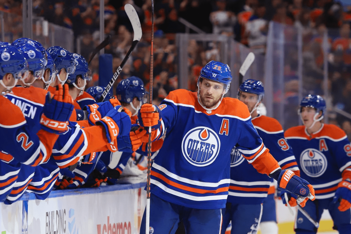 Oilers burning orange and blue