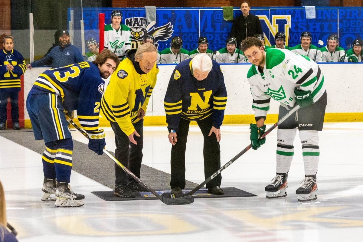 banner raising men hockey nait